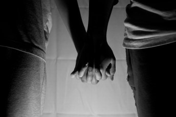 two people holding hands